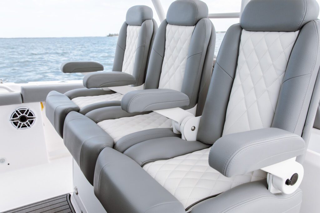 740 White boat seats with arm rests on the everglades boat