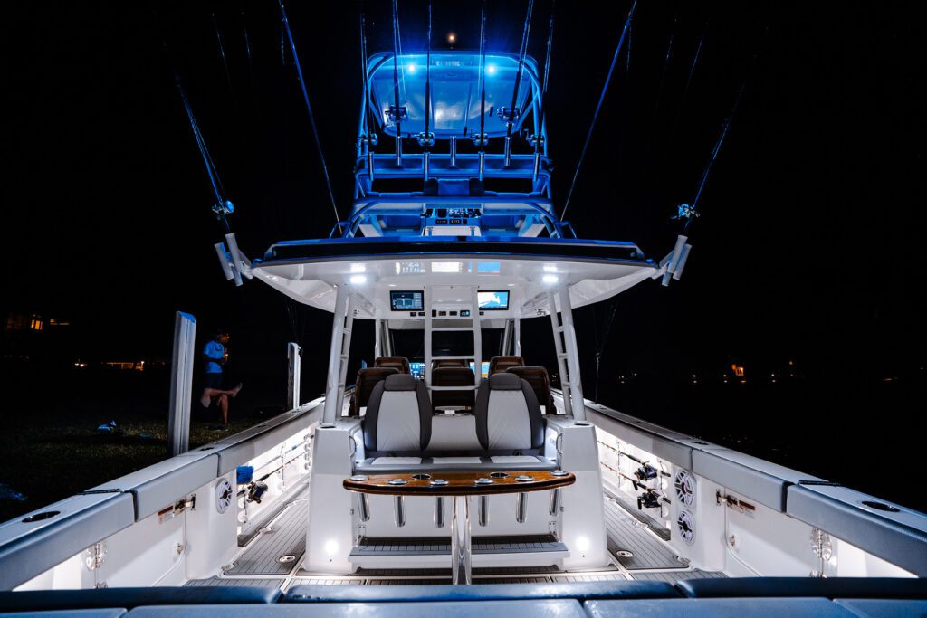 everglades_455cc_exterior_night lighting_DSC04293 Close-up shot of the hybrid boat at night, highlighting the back with its illuminated features and design details