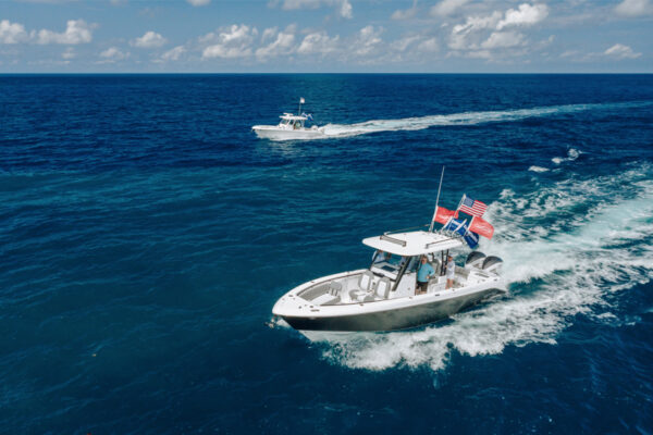 DJI_0559_6928 Two boats with people driving through blue water