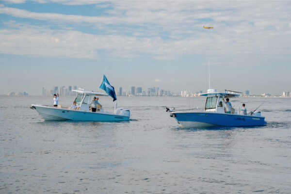 JJS06726_6209 Two Everglades boats cruising side by side off the coast of Florida.