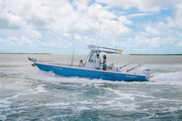 JJS06861_5993 Three people on an Everglades boat