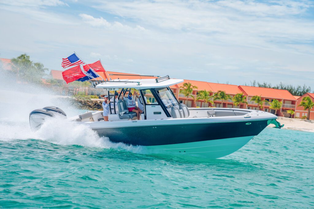 JJS09739 High speed driving the everglade boats with patriotic flags