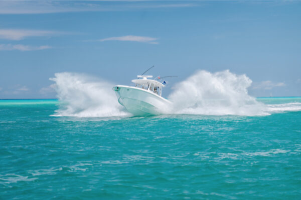 JJS09947_6688 An Everglades boat creating a large splash with a clear sky in the background