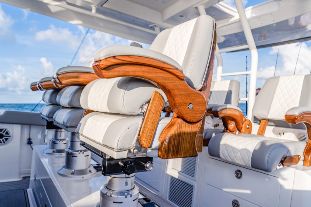 everglades_455cc_exterior_console helm seating_DSC2704 Close-up shot of the luxury chairs and premium features on the Everglades boat, showcasing elegant design and comfort