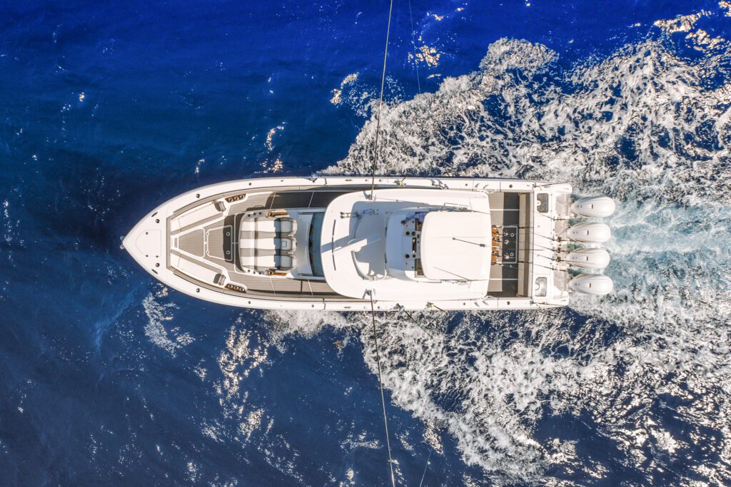 everglades_455cc_exterior_overhead_DJI_0003 Birds eye perspective of fishing boat in deep blue water