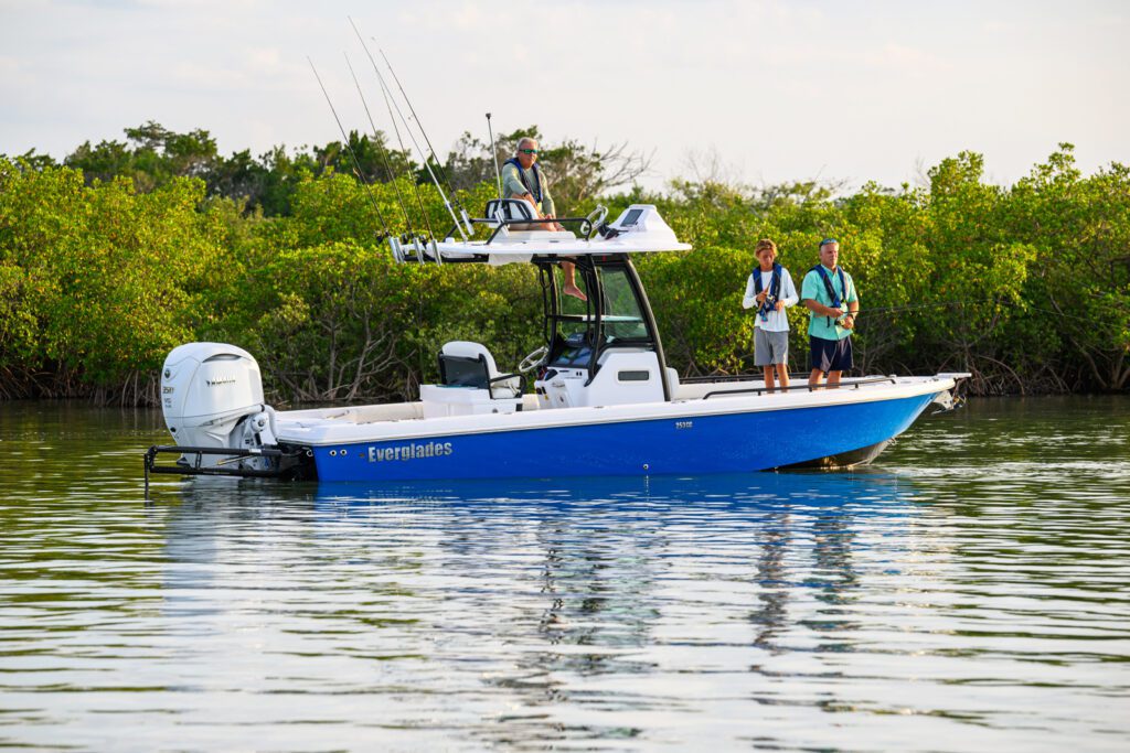 253-fishing men fishing in coastal waters from an Everglades hybrid boat