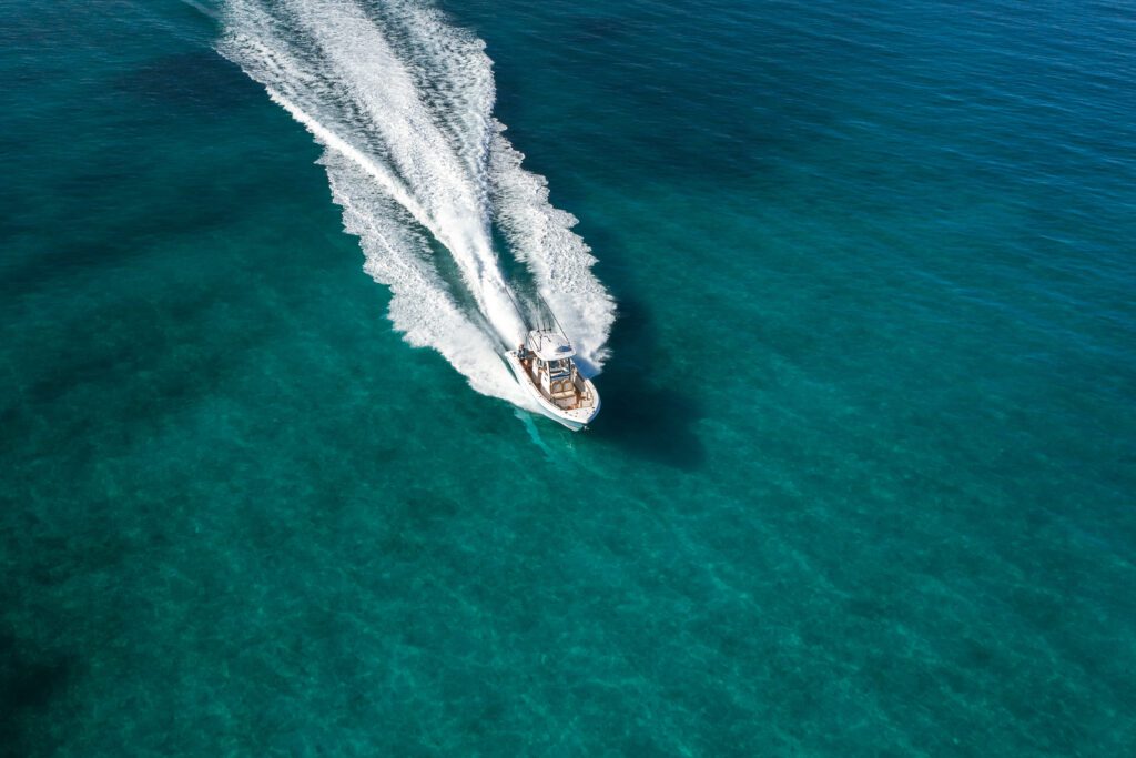 829 A boat driving through water